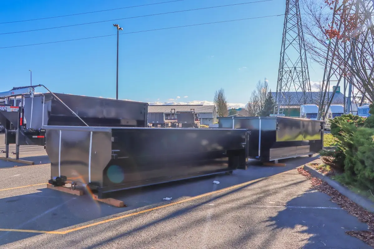 Roll-off dumpster ready for waste disposal at job site for Commercial Dumpster Rental in Taunton
